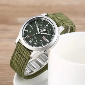 Relógio Masculino Original SEIKO SNK805: Luxo e Estilo com Mostrador Verde e Pulseira de Tecido - Elegância Casual Esportiva!